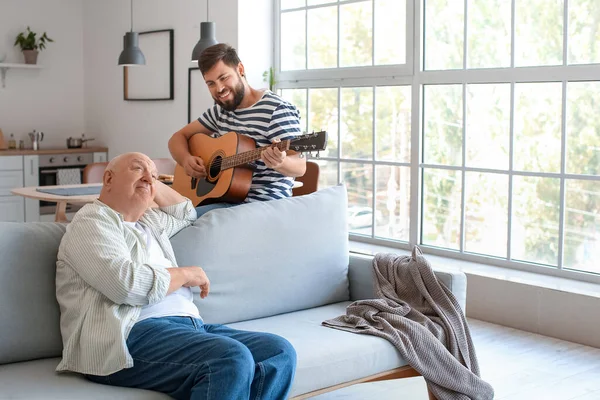Happy Man Playing Guitar His Father Home — Stock Photo, Image
