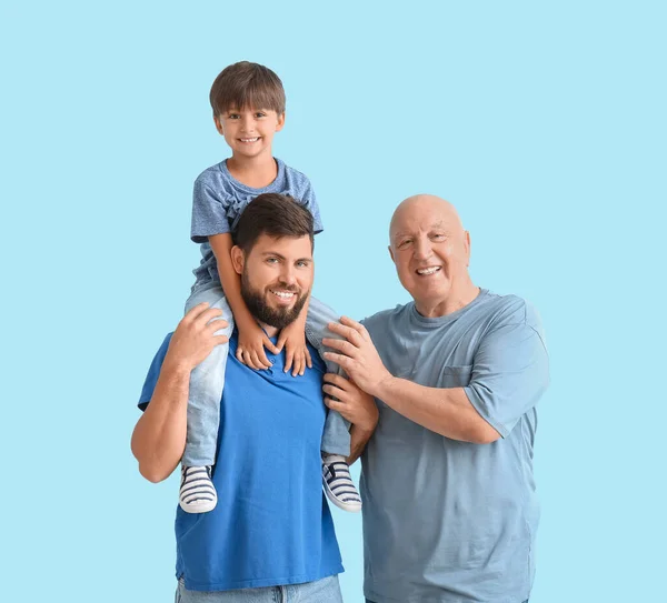 Glücklicher Mann Sein Kleiner Sohn Und Vater Auf Farbigem Hintergrund — Stockfoto