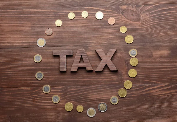 Word Tax Coins Wooden Background — Stock Photo, Image