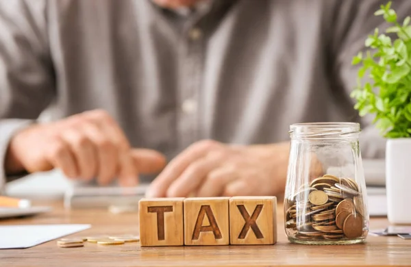 Word Tax Coins Jar Table — Stock Photo, Image