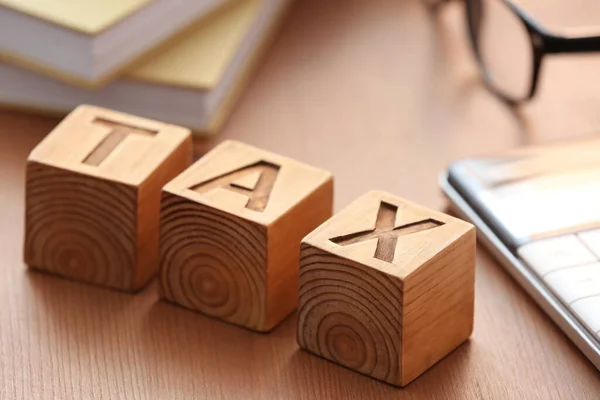 Cubes Word Tax Table — Stock Photo, Image