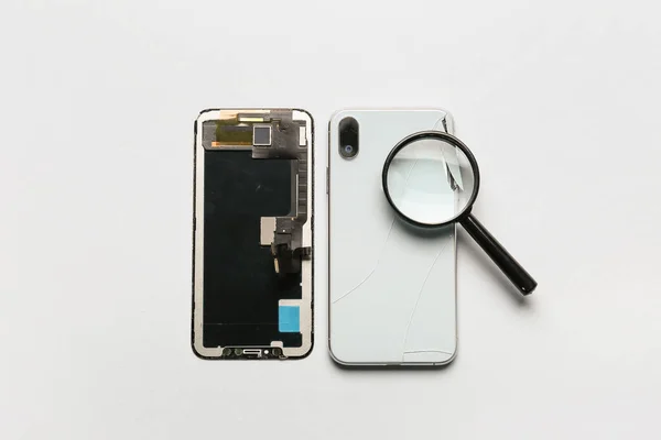 Disassembled Mobile Phone Magnifier White Background — Stock Photo, Image