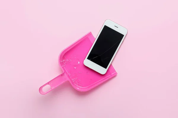 Mobile Phone Broken Screen Scattered Glass Dustpan Pink Background — Stock Photo, Image