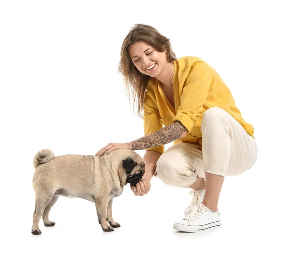 Young Woman Feeding Cute Pug Dog White Background — Stock Photo, Image