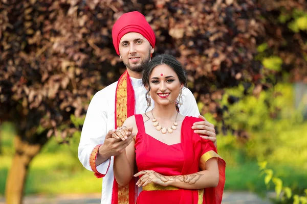 Beautiful Indian wedding couple on summer day