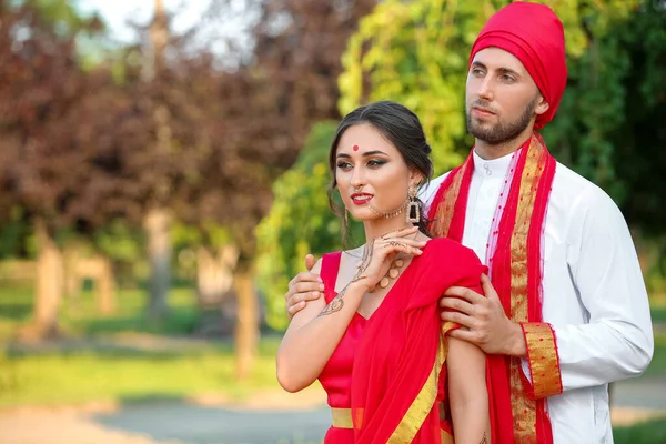 Beautiful Indian wedding couple on summer day