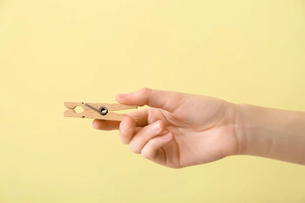 Woman Holding Clothespin Yellow Background — Stock Photo, Image