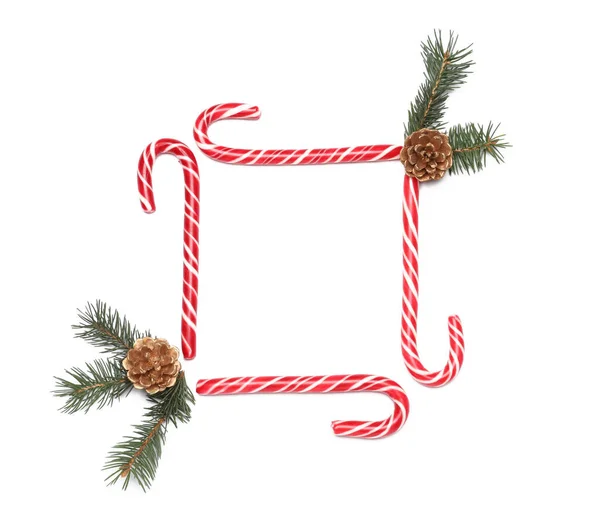 Frame Made Candy Canes Cones Pine Branches White Background — Stock Photo, Image