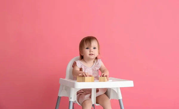 Cute Baby Girl Sitting Feeding Chair Color Background — Stock Photo, Image