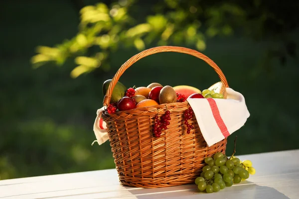 Wicker Basket Fresh Fruits Table Outdoors — Stock Photo, Image