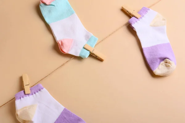 Different Socks Hanging Clothesline Color Background Closeup — Stock Photo, Image