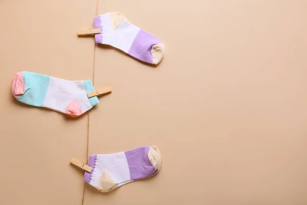 Different Socks Hanging Clothesline Color Background — Stock Photo, Image