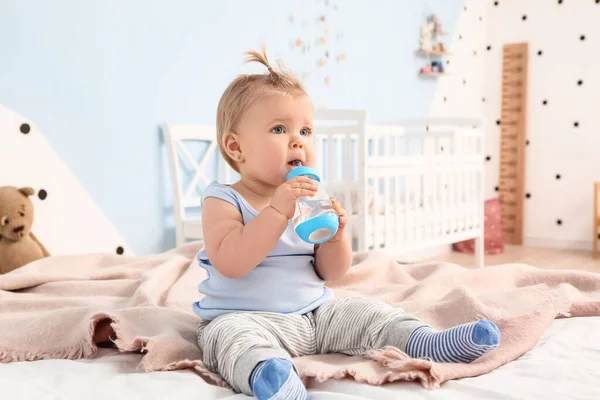 Cute Baby Girl Drinking Water Bottle Bedroom — Stock Photo, Image