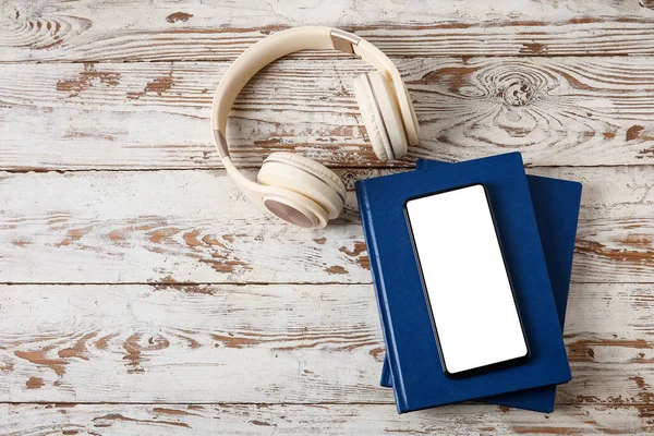 Modern Mobile Phone Headphones Books Light Wooden Background — Stock Photo, Image