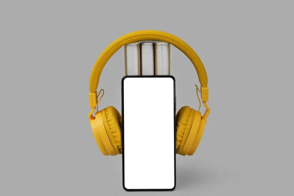 Modern Mobile Phone Headphones Books Grey Background — Stock Photo, Image