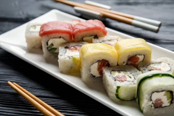 Set Delicious Sushi Rolls Grey Wooden Table — Stock Photo, Image