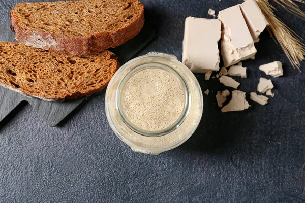 Glass Jar Fresh Sourdough Bread Slices Black Background — Stock Photo, Image