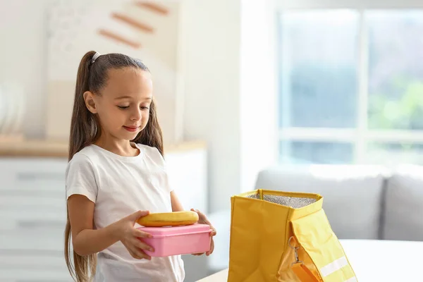 Cute Little Girl Putting Her Lunch Bag — Stock Photo, Image