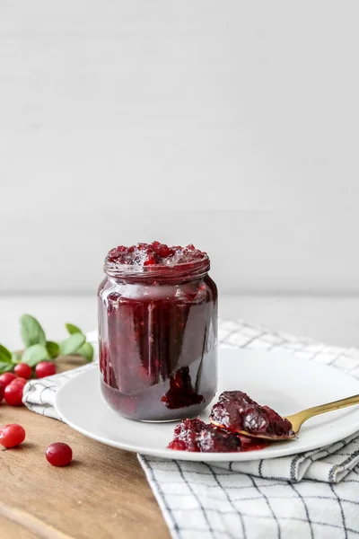 Jar Tasty Cranberry Jam Light Background — Stock Photo, Image