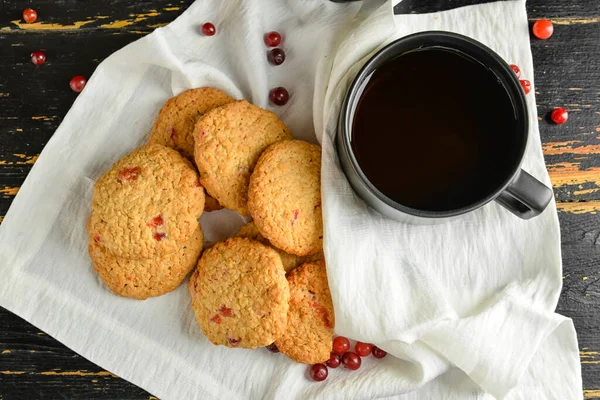 Tasty Cranberry Cookies Cup Tea Dark Wooden Background Closeup — Stock Photo, Image