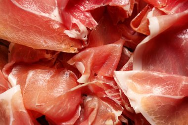 Lezzetli prosciutto dilimlerinin dokusu, yakından.