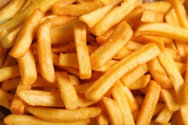 Arka plan olarak lezzetli patates kızartması dokusu.