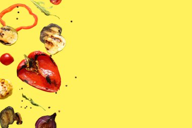 Sarı arka planda uçuşan farklı lezzetli ızgara sebzeler.