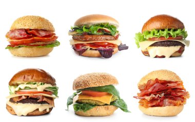 Beyaz arka planda değişik lezzetli hamburgerler.