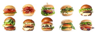Beyaz arka planda değişik lezzetli hamburgerler.