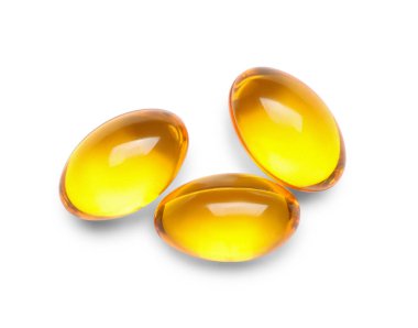 e vitamini kapsülleri beyaz zemin üzerine