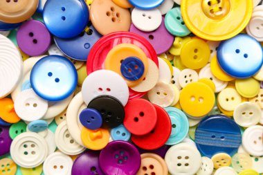 Farklı renkli düğmelerin dokusu, yakın plan