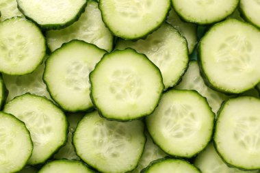 Arka plan olarak dilimlenmiş salatalık dokusu