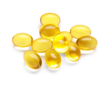 e vitamini kapsülleri beyaz zemin üzerine