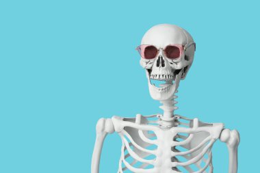 Mavi arka planda güneş gözlüklü komik insan iskeleti