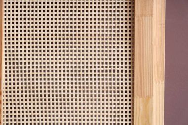 Kahverengi arkaplanda hasır doku, yakın plan