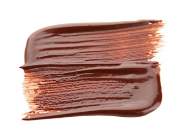 Beyaz arka planda izole edilmiş lezzetli çikolata kokuları, yakın plan.