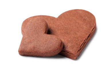 Beyaz arka planda Sevgililer Günü için leziz kalp şekilli kurabiyeler