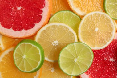 Arkaplan olarak farklı narenciye dilimleri