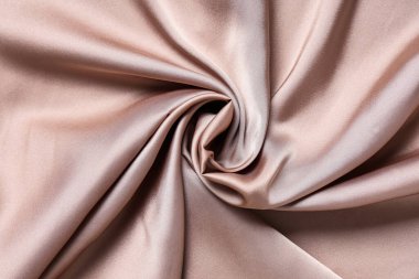 Arkaplan olarak bej saten kumaş dokusu