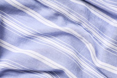 Arkaplan olarak mavi çizgili kumaşın dokusu