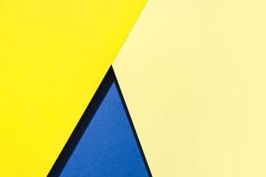 Arkaplan olarak sarı ve mavi kağıt kağıtlar