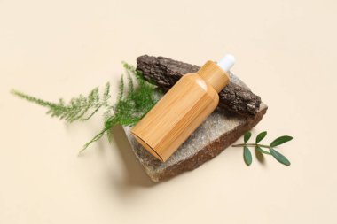 Renkli arka planda gerekli yağ, taş ve bitki yapraklarıyla bileşim