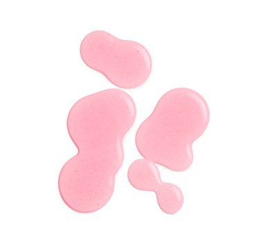 Beyaz arka planda pembe kozmetik yağ damlaları