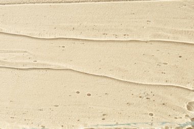 Bej arkaplanda kozmetik yağ dokusu