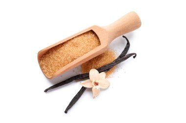 Vanilya şekerli kepçe, çiçek ve beyaz arka planda çubuklar