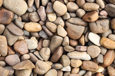 Arka plan olarak çakıl taşlarının dokusu, üst görünüm