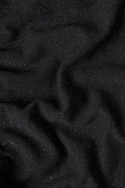 Arkaplan olarak simli siyah örgü kumaş dokusu