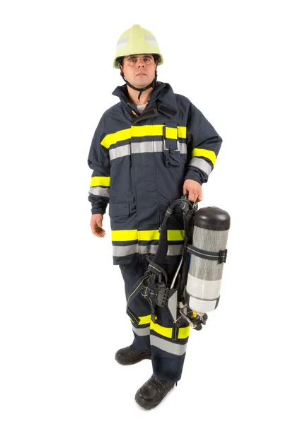 Brandweerman in uniform geïsoleerd in wit — Stockfoto