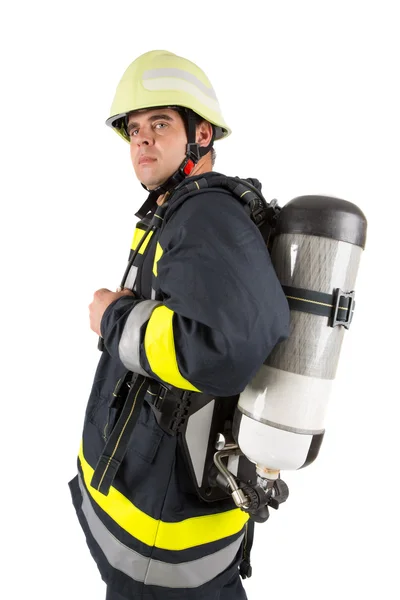 Pompiere in uniforme isolato in bianco — Foto Stock