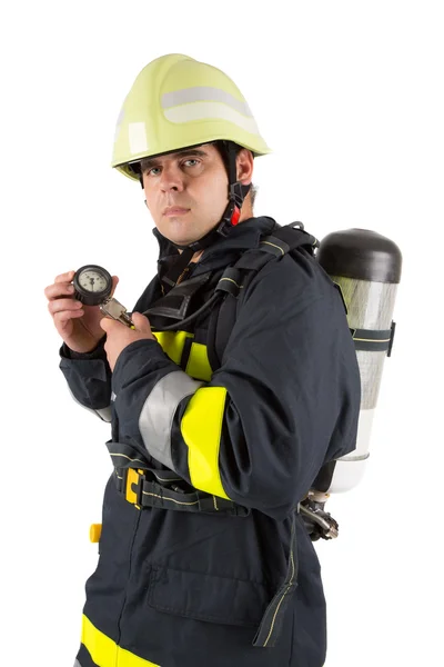 Fireman in uniform isolated in white — Stock Photo, Image